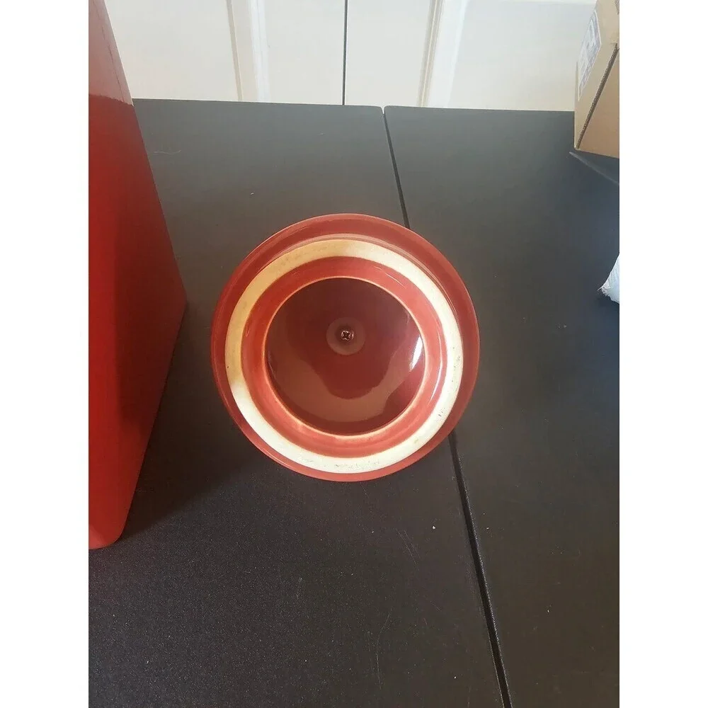 Belaverra red ceramic canister with metal base